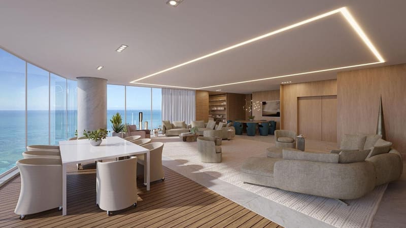 Render of a dining and living room with a sea view
