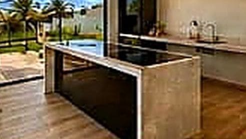 Kitchen with the gourmet area and its island counter