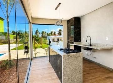 Kitchen island looking out to the garden and the pool