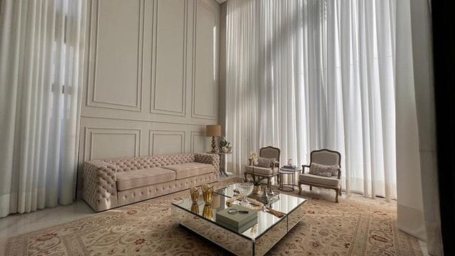 Living room with panelled walls