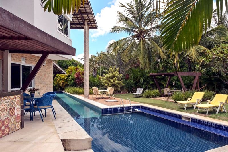 Lap pool and gourmet area of the house in Busca Vida, Bahia