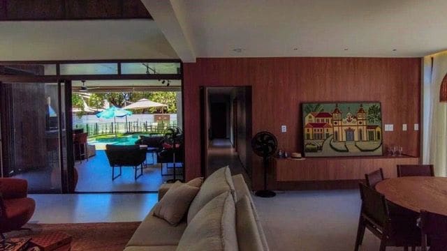 Living room opening to the pool area