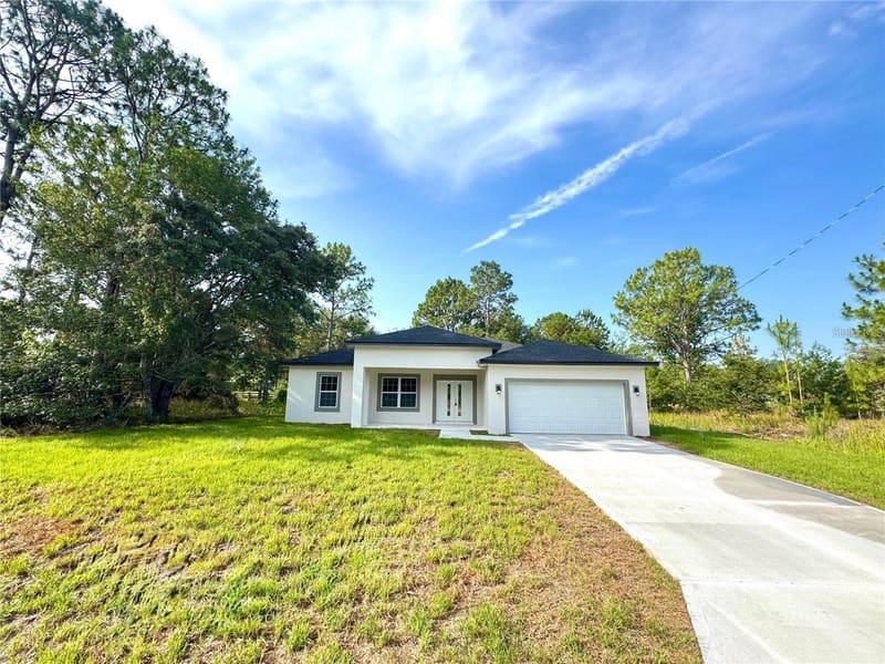 Home set back on a green lawn