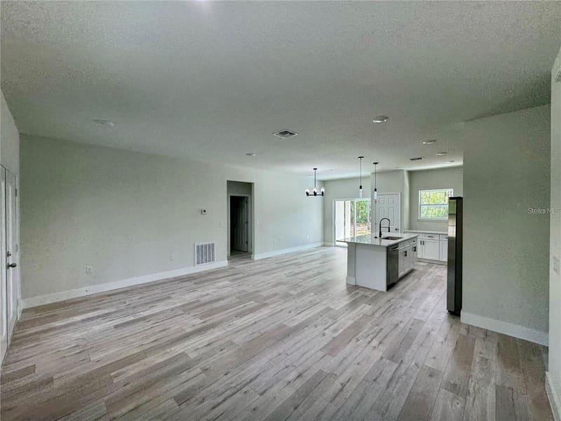 Open living area leading to the kitchen