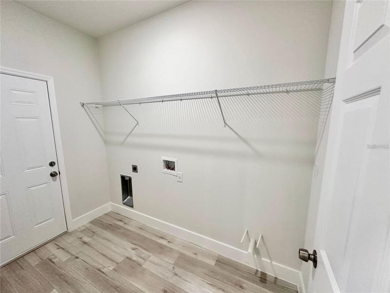 Laundry room with wire shelving