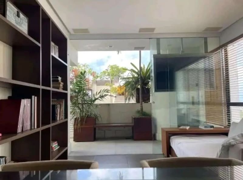 Room with shelving and a view