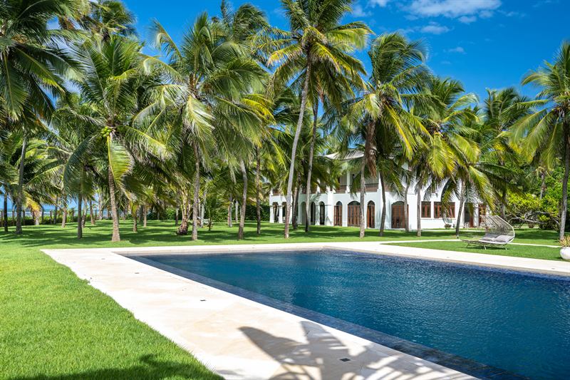 Pool with the house behind