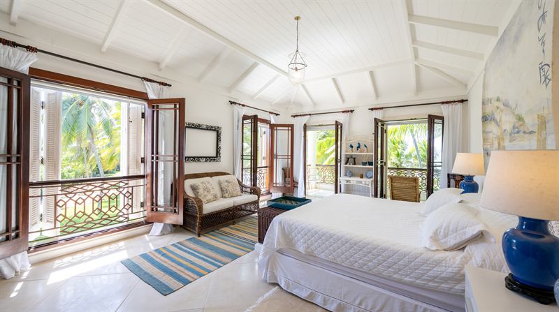 Upper veranda overlooking the garden and the ocean