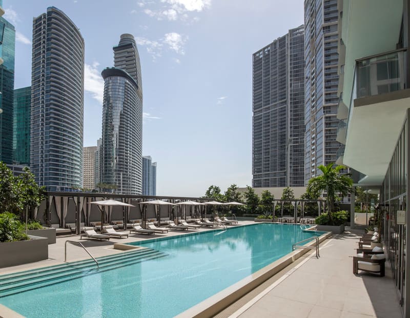 Heated pool on the 14th floor amenity deck with the Brickell skyline