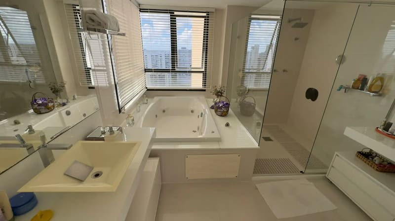 Master en-suite bathroom with a whirlpool tub